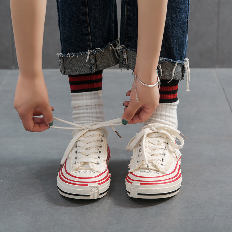 The same low-top canvas shoes